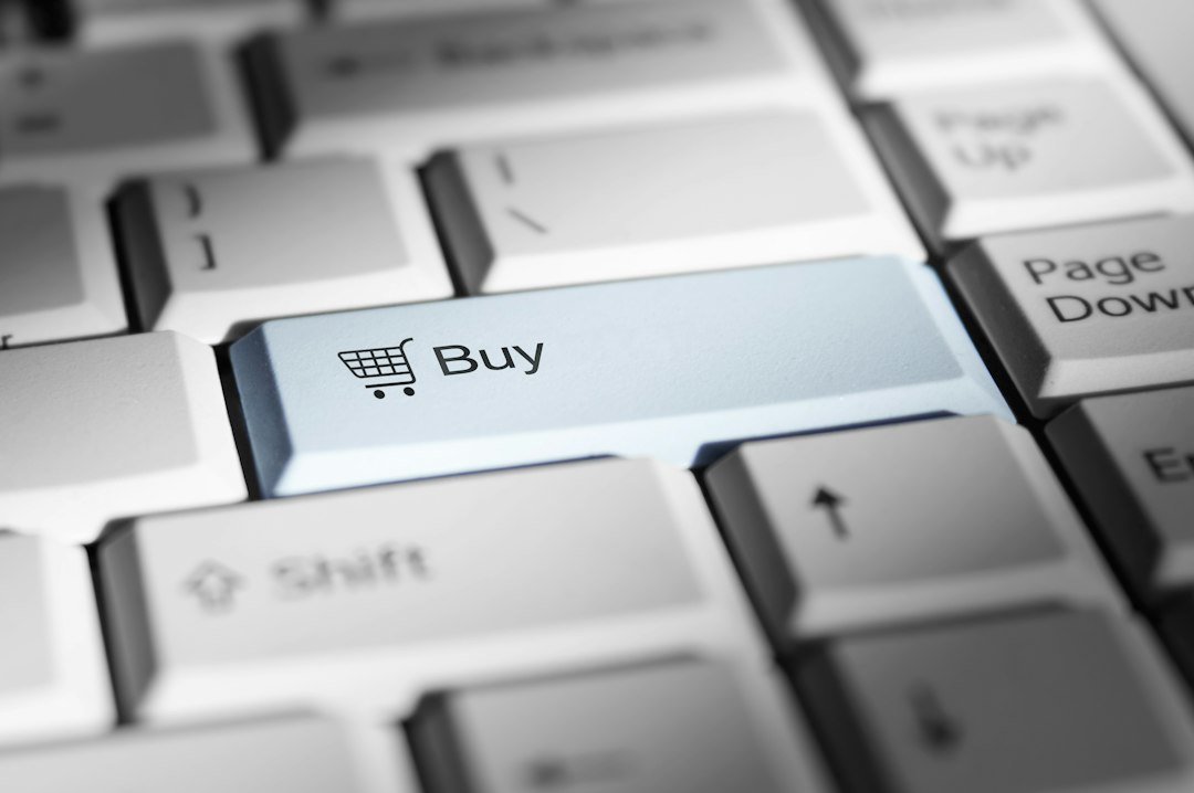 Shopping cart icon and Buy key on a computer keyboard